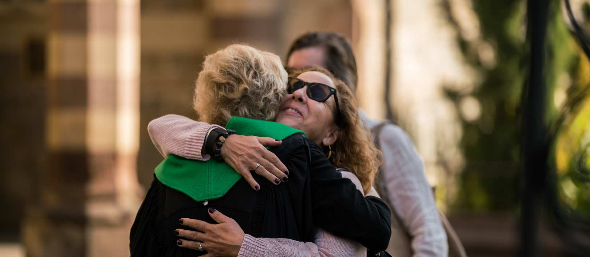 Pastor Nancy hugging a member